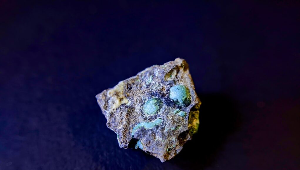 a piece of rock sitting on top of a table