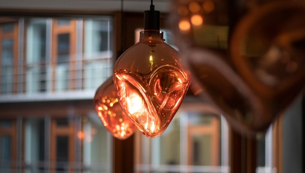 selective focus photography of light bulb