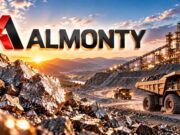 Almonty-Aktie mit -65% – steht die Trendwende jetzt an? Almonty logo over a rocky open-pit mine with large dump trucks and an industrial plant at sunset