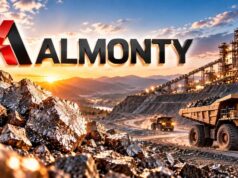 Almonty-Aktie mit -65% – steht die Trendwende jetzt an? Almonty logo over a rocky open-pit mine with large dump trucks and an industrial plant at sunset